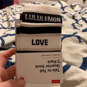 Tan and black lululemon socks. brand new